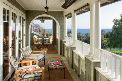 Mid-sized classic porch idea in Santa Barbara with a roof extension
