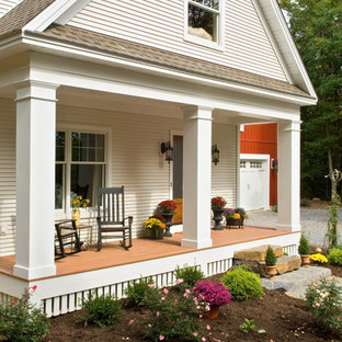 Ornate porch idea in New York with a roof extension