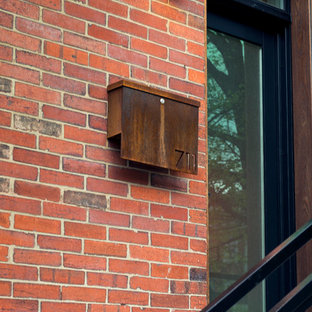 Immagine di un piccolo portico minimalista davanti casa