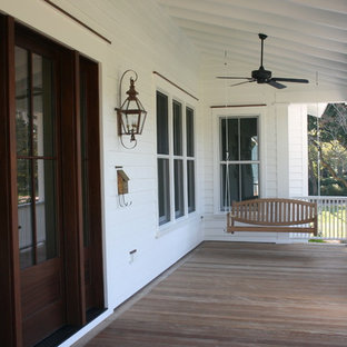 Classic porch idea in Charleston with decking