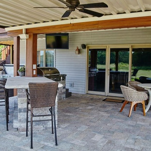 Foto di un ampio patio o portico bohémian dietro casa