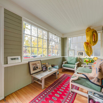 This fantastic enclosed porch: can't you see a nap on that couch being awesome?