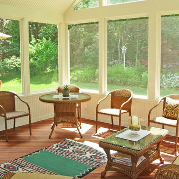 Three seasons of happiness encompass this deck and three season room addition