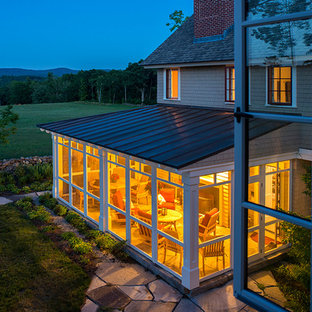 Classic porch idea in Boston with a roof extension