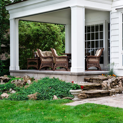 Classic porch idea in Toronto with a roof extension