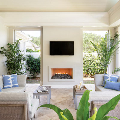 Mid-sized beach style tile screened-in back porch photo in Miami with a roof extension