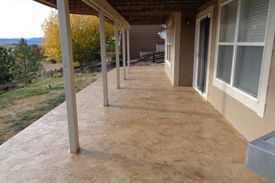 This is an example of a rustic veranda in Denver.