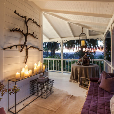 Mid-sized country side porch photo in San Francisco with a roof extension