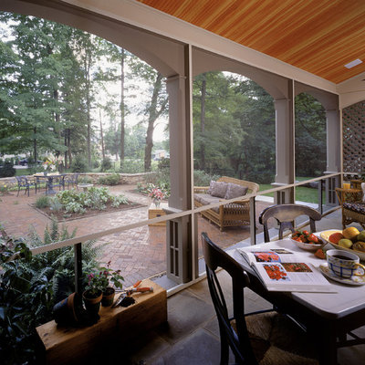 Elegant porch photo in New York with a roof extension