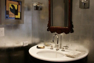 Example of a mid-sized trendy powder room design in Other