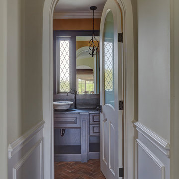 Arched Door Opening to Powder Room