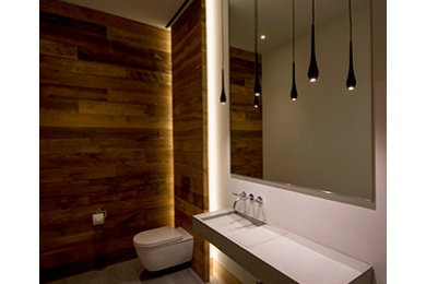 Example of a minimalist powder room design in New York