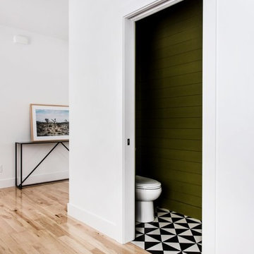 Bold Black and White Triangle Powder Room