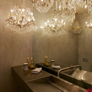 Esempio di un bagno di servizio design con top in acciaio inossidabile, lavabo integrato e pareti grigie