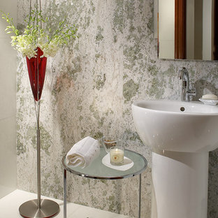 Example of a small minimalist marble floor powder room design in Miami with white walls