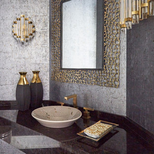 Inspiration for a mid-sized contemporary wallpaper powder room remodel in Chicago with gray walls, a vessel sink, brown countertops, a floating vanity, brown cabinets and granite countertops