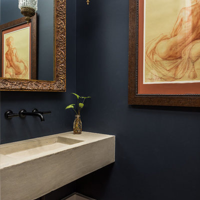 Tuscan powder room photo in Charleston with an integrated sink, concrete countertops and blue walls