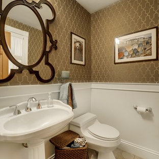 Inspiration for a traditional powder room in Minneapolis with a pedestal sink, a one-piece toilet and beige tile.