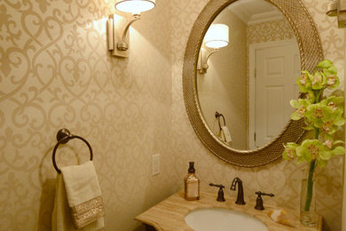 Powder room - traditional powder room idea in New York with beige walls