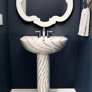 Front view of the Gold Swirling Lines pedestal sink.