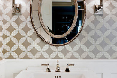 Example of a classic powder room design in Chicago with a pedestal sink