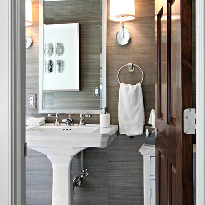 Powder room - small transitional mosaic tile floor powder room idea in New York with a pedestal sink and gray walls