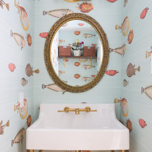 Inspiration for a small transitional powder room remodel in San Francisco with a console sink