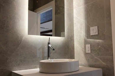 Example of a minimalist powder room design in Montreal