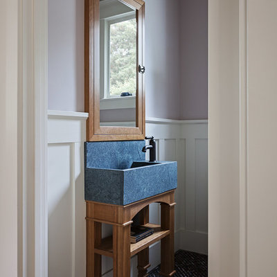 Powder room - mid-sized craftsman multicolored floor powder room idea in San Francisco with purple walls and a console sink