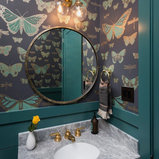 Powder room - transitional powder room idea in Austin with multicolored walls, an undermount sink and marble countertops