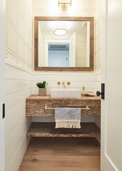 Beach Style Powder Room by Noelle Interiors