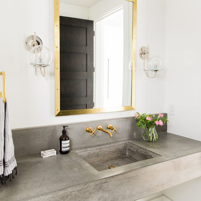 Powder room - transitional multicolored floor powder room idea in Salt Lake City with white walls, concrete countertops, an integrated sink and gray countertops