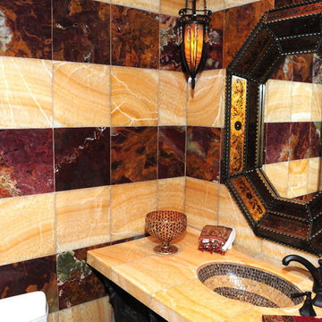 Morrocan inspired Powder room with Onyx banded tile walls