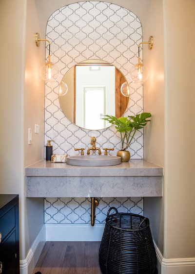 Eclectic Powder Room by AJP Properties