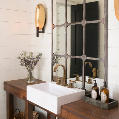 Transitional powder room photo in Other with a drop-in sink, open cabinets, wood countertops, white walls and brown countertops