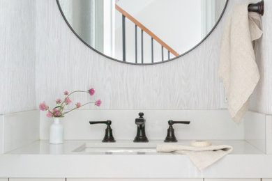 Inspiration for a small traditional cloakroom in San Francisco with flat-panel cabinets, beige cabinets, grey walls, a submerged sink, multi-coloured floors, beige worktops and a floating vanity unit.