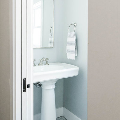 Powder room - small farmhouse marble floor and gray floor powder room idea in Portland Maine with gray walls and a pedestal sink