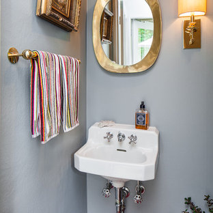 Trendy powder room photo in San Francisco with a wall-mount sink