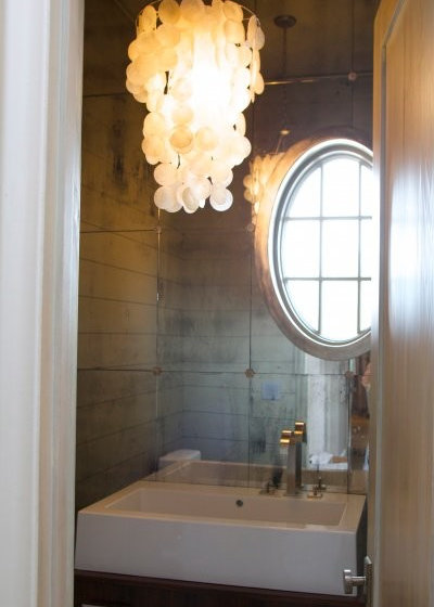 Beach Style Powder Room by Tracery Interiors