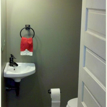 Powder room under the stairs