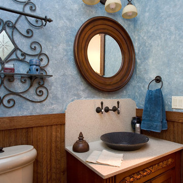 Powder room vanity with bead board wainscot and blue faux finish walls
