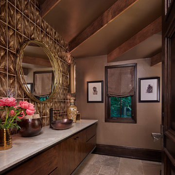 Powder Room with Bronze Vessel Sink, Tile Wall and Gold Mirror