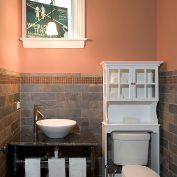 Powder Room with Custom Iron and Stone Vanity Features Vessel Bowl Sink