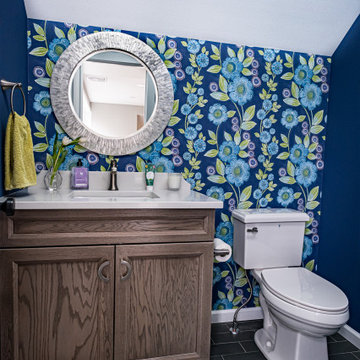 Powder Room with Floral Wallpaper and Wood Vanity