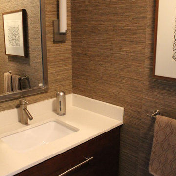 Powder Room with Grasscloth Wallpaper, Walnut Stained Cabinetry & Modern Fixtu