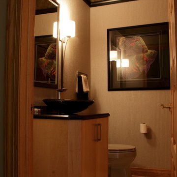 remodel powder room with decorative glass sink and sconces