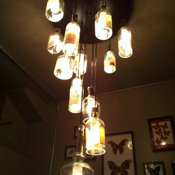 Repurposed whisky bottle chandelier