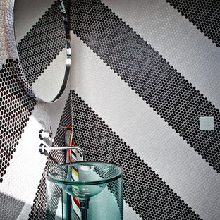 Design ideas for a contemporary powder room in Melbourne with black and white tile, mosaic tile and a console sink.
