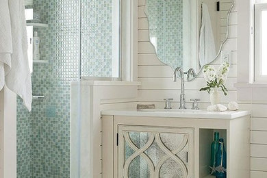 フェニックスにある小さなコンテンポラリースタイルのおしゃれなトイレ・洗面所 (白いキャビネット、青いタイル、ガラスタイル、白い壁、アンダーカウンター洗面器、クオーツストーンの洗面台、白い洗面カウンター) の写真