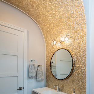 Powder room - mid-sized modern metal tile powder room idea in Columbus with flat-panel cabinets, quartzite countertops and white countertops